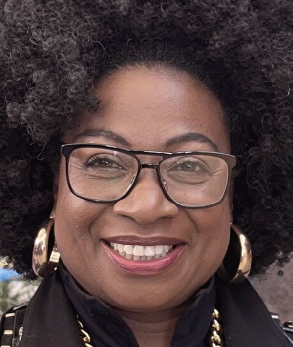 Reverend Dr Caroly